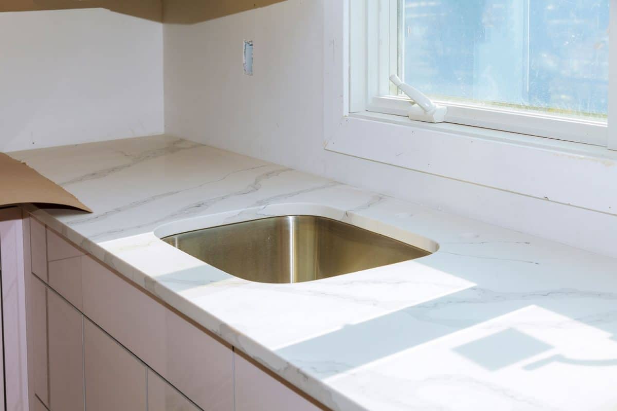 A white marble texture laminate kitchen countertop