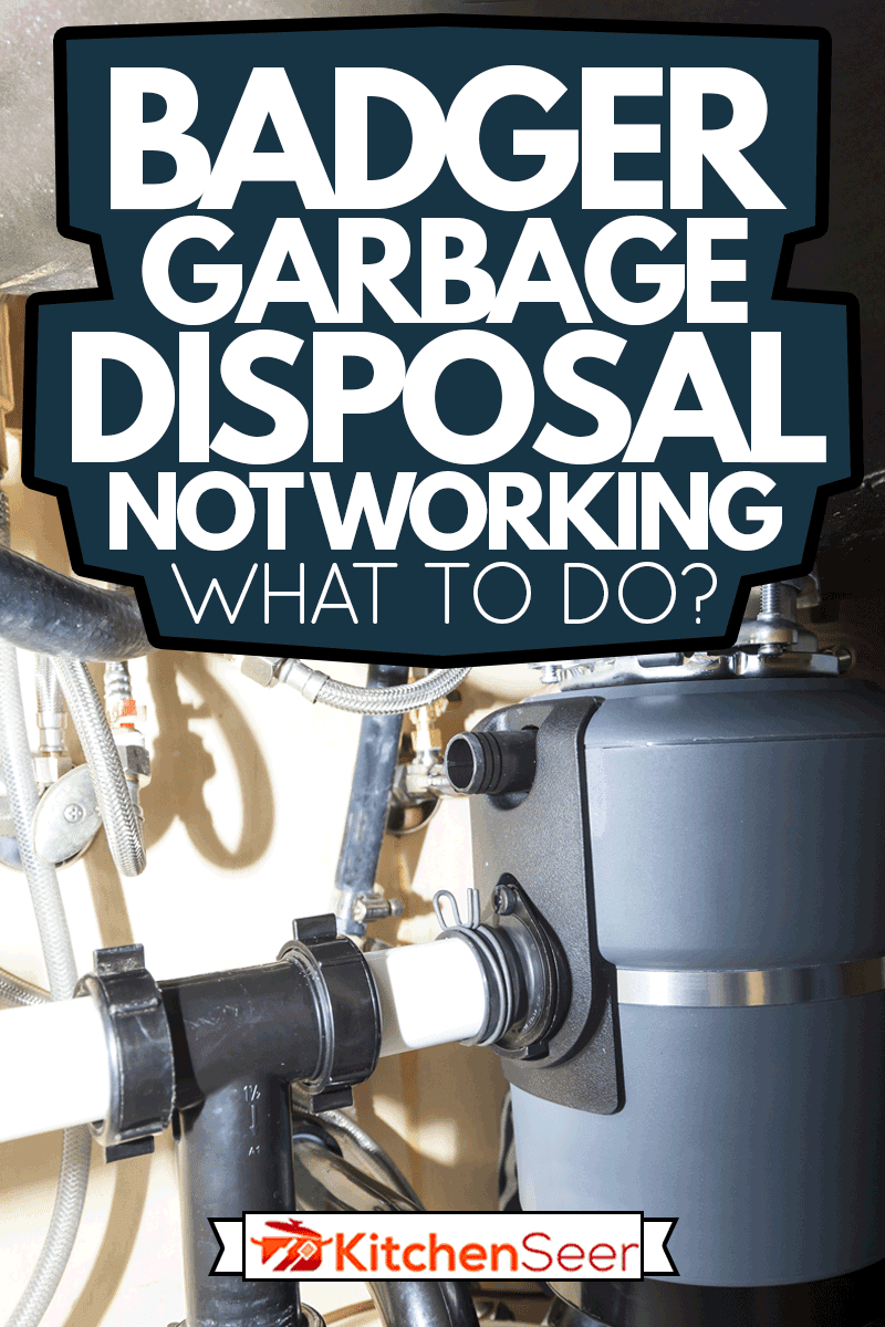 Man installing garbage disposal in home, Badger Garbage Disposal Not Working - What To Do?