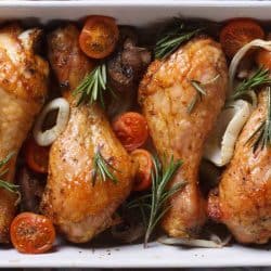 Baked chicken legs with vegetables close-up, How Long Should You Bake Chicken Legs And At What Temperature?