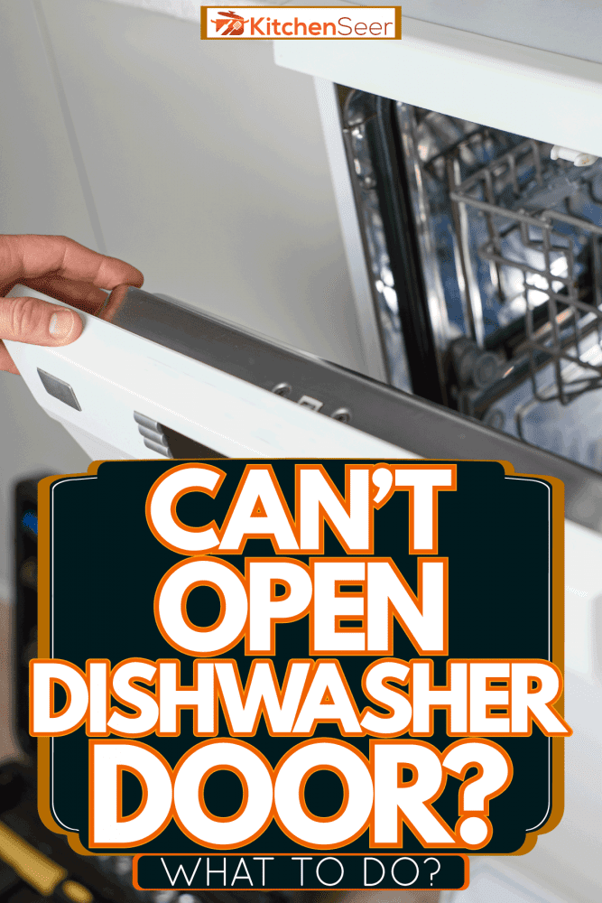 A worker repairing the dishwasher door, Can't Open Dishwasher Door—What To Do?