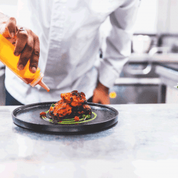 Chicken-Tikka-been-platted-by-a-professional-chef-on-a-cast-iron-plate.-What-Kind-Of-Plates-Are-Oven-Safe