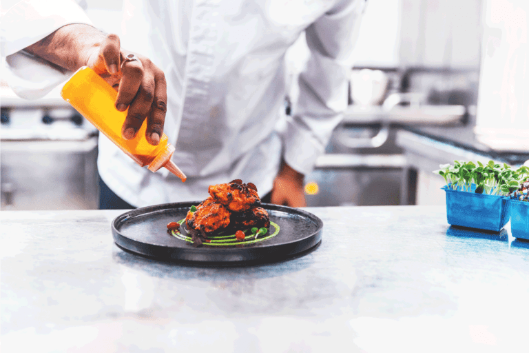 Chicken-Tikka-been-platted-by-a-professional-chef-on-a-cast-iron-plate.-What-Kind-Of-Plates-Are-Oven-Safe