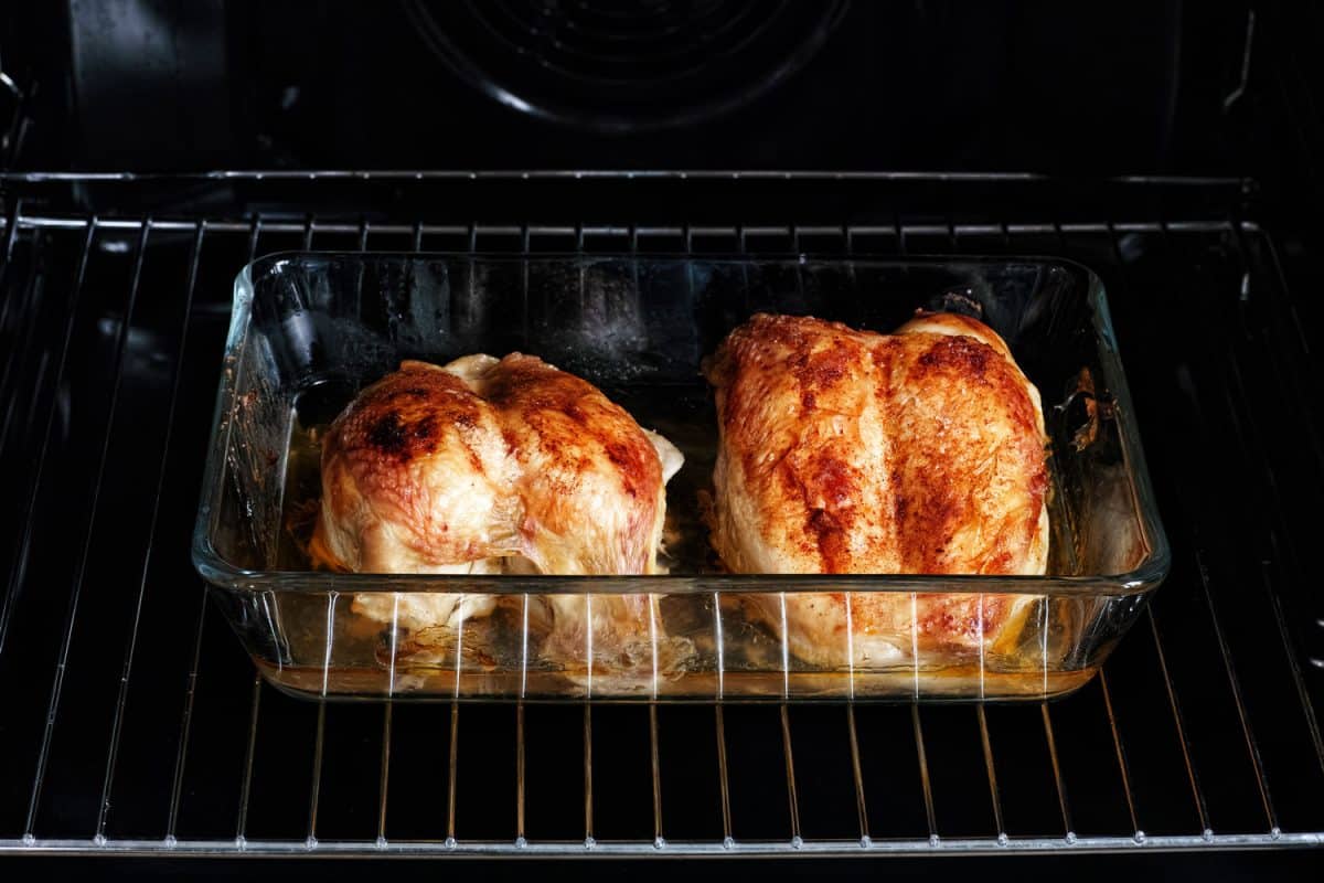 Delicious baked chicken in glass Tupperware