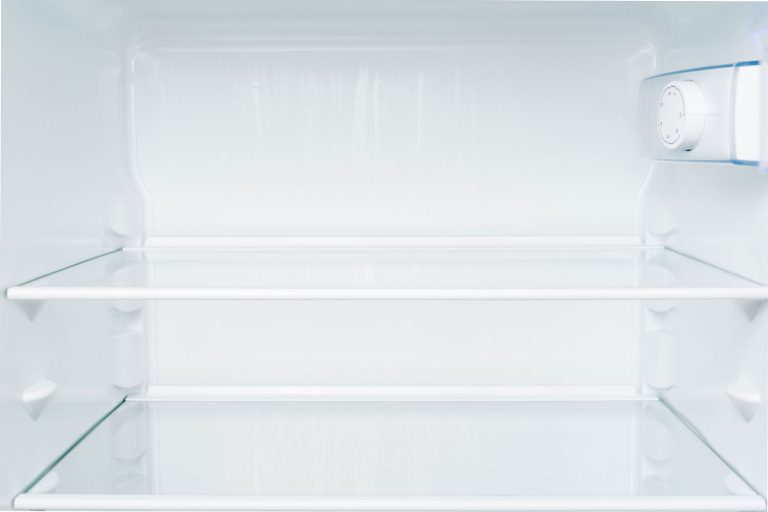 Empty shelves in refrigerator