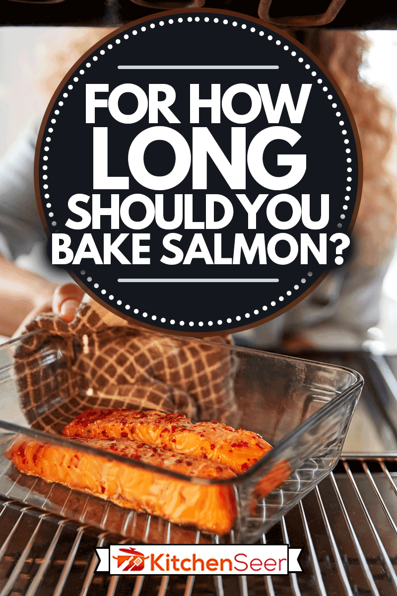 View Looking Out From Inside Oven As Woman Cooks Oven Baked Salmon, For How Long Should You Bake Salmon?
