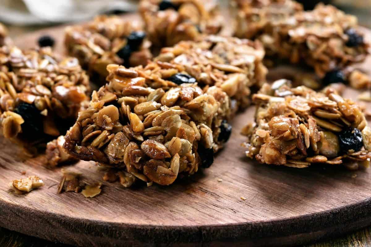 Granola pieces on wooden board