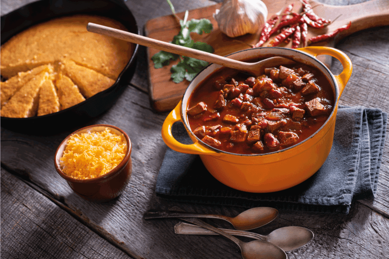 Homemade Chicken Chili with Corn Bread cooked on a dutch oven. What Should You Cook In A Dutch Oven [15 Suggestions To Try Out!]