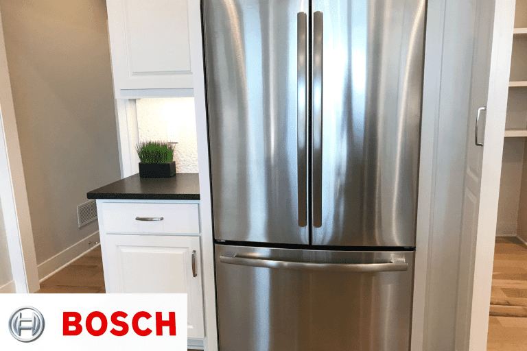 A big double door refrigerator with a small cabinet on the side in a rustic kitchen, How To Replace Water Filter In Bosch Refrigerator