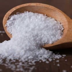 Kosher salt spilled from a spice jar, Should You Use Kosher Salt In Baking?