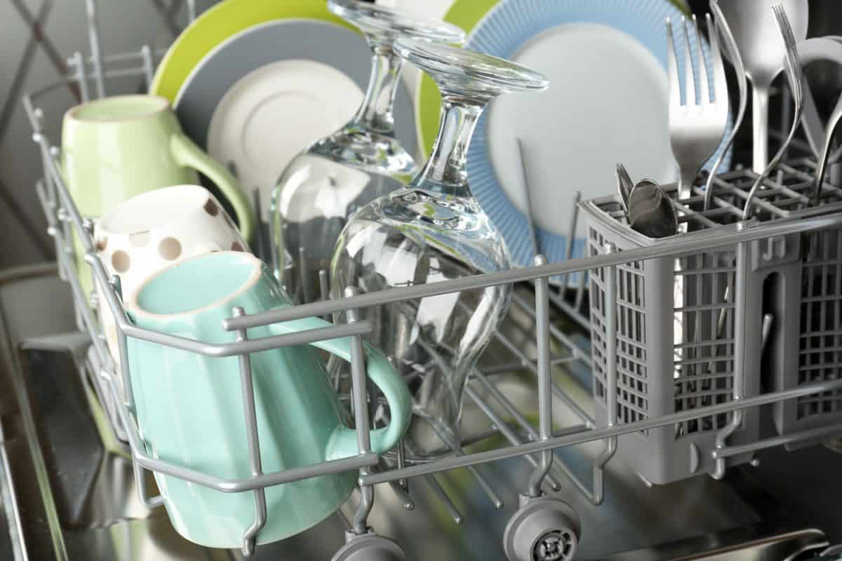 Newly washed dishes in the dishwasher