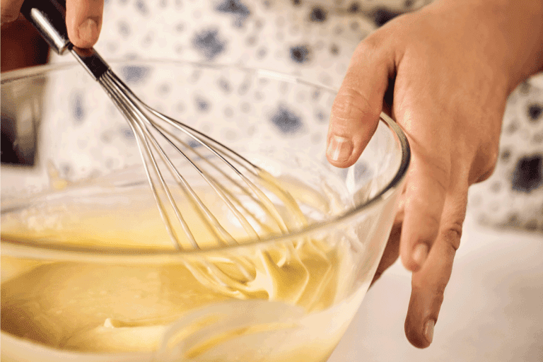 Preparing-homemade-simple-yellow-batter-to-bake-a-delicious-cake.-Should-You-Let-Cake-Batter-Rest-Before-Baking