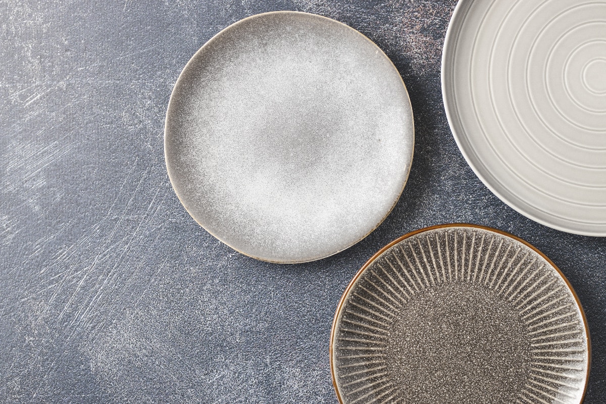 Three modern ceramic empty plates