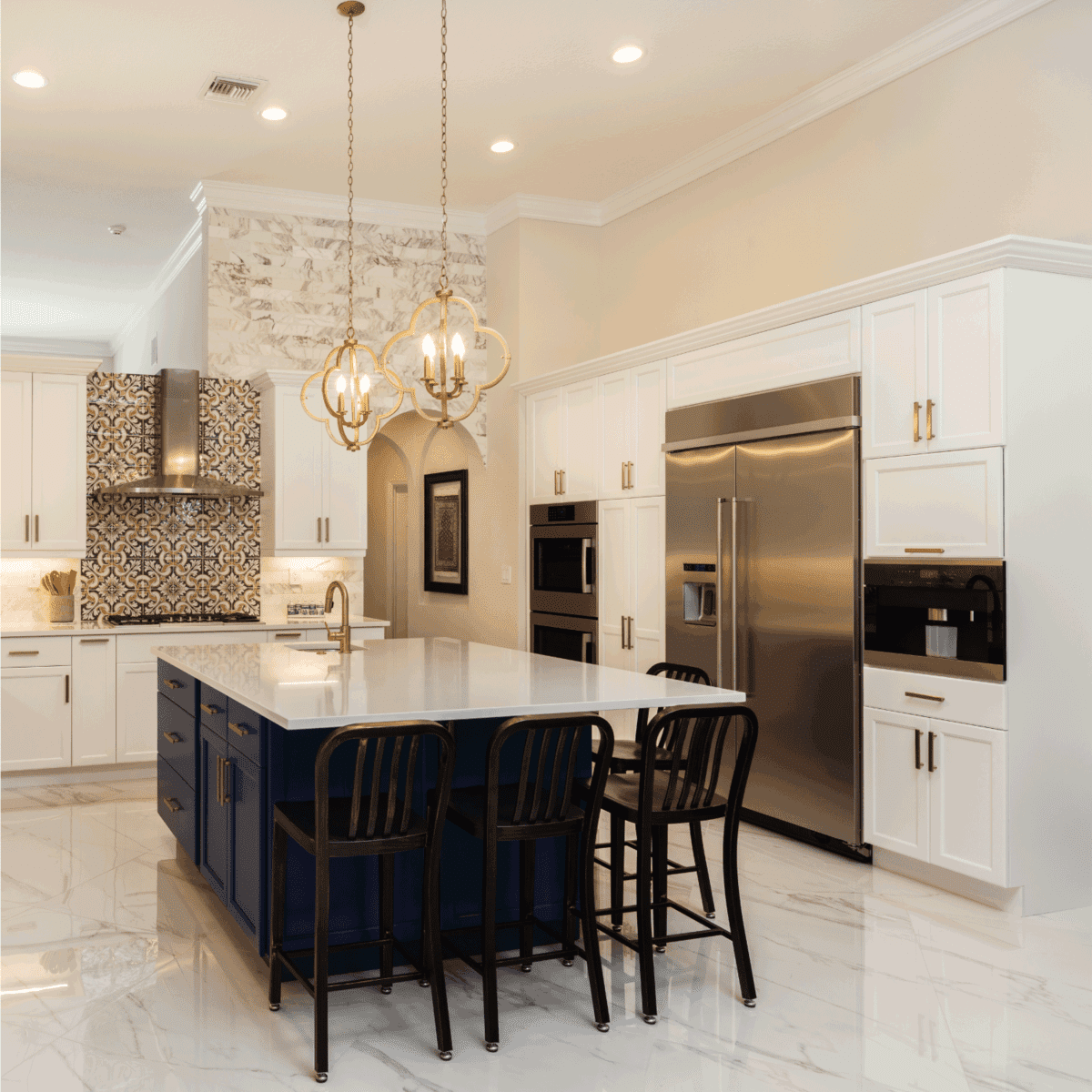 Beautiful luxury estate home kitchen with white cabinets and large Bosch freezer