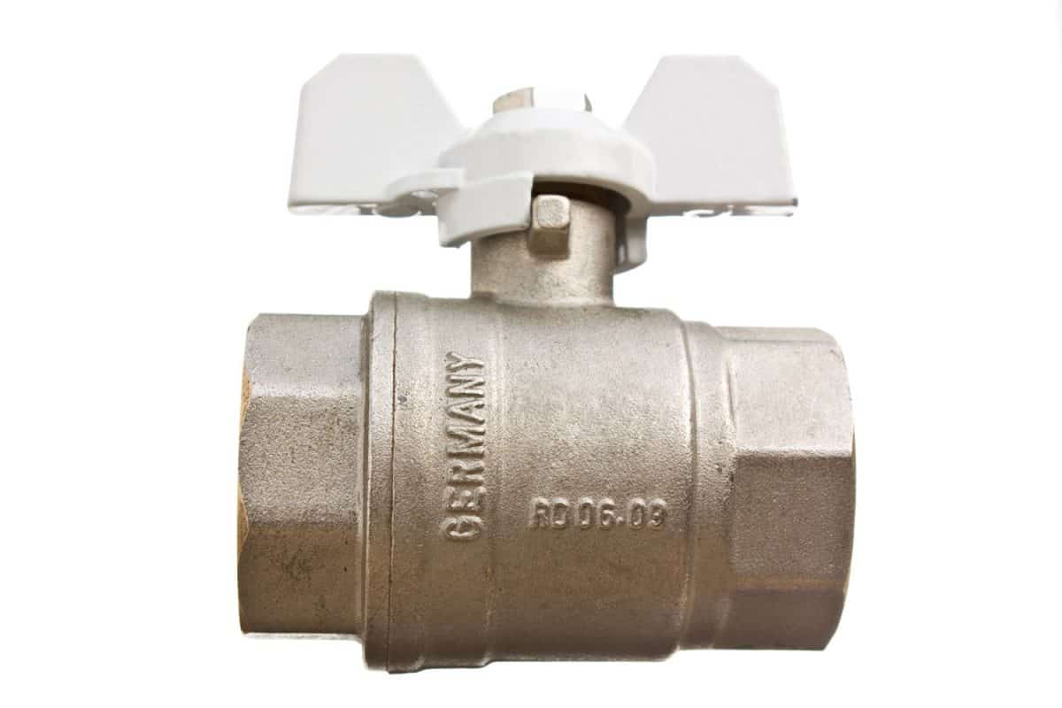 Brass valve inlet on a white background