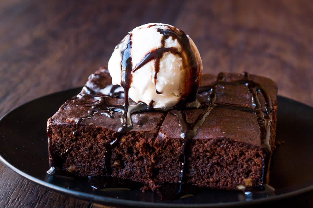 Chocolate brownie with ice cream and hazelnut powder, Should You Put Brownies In The Fridge After Baking?