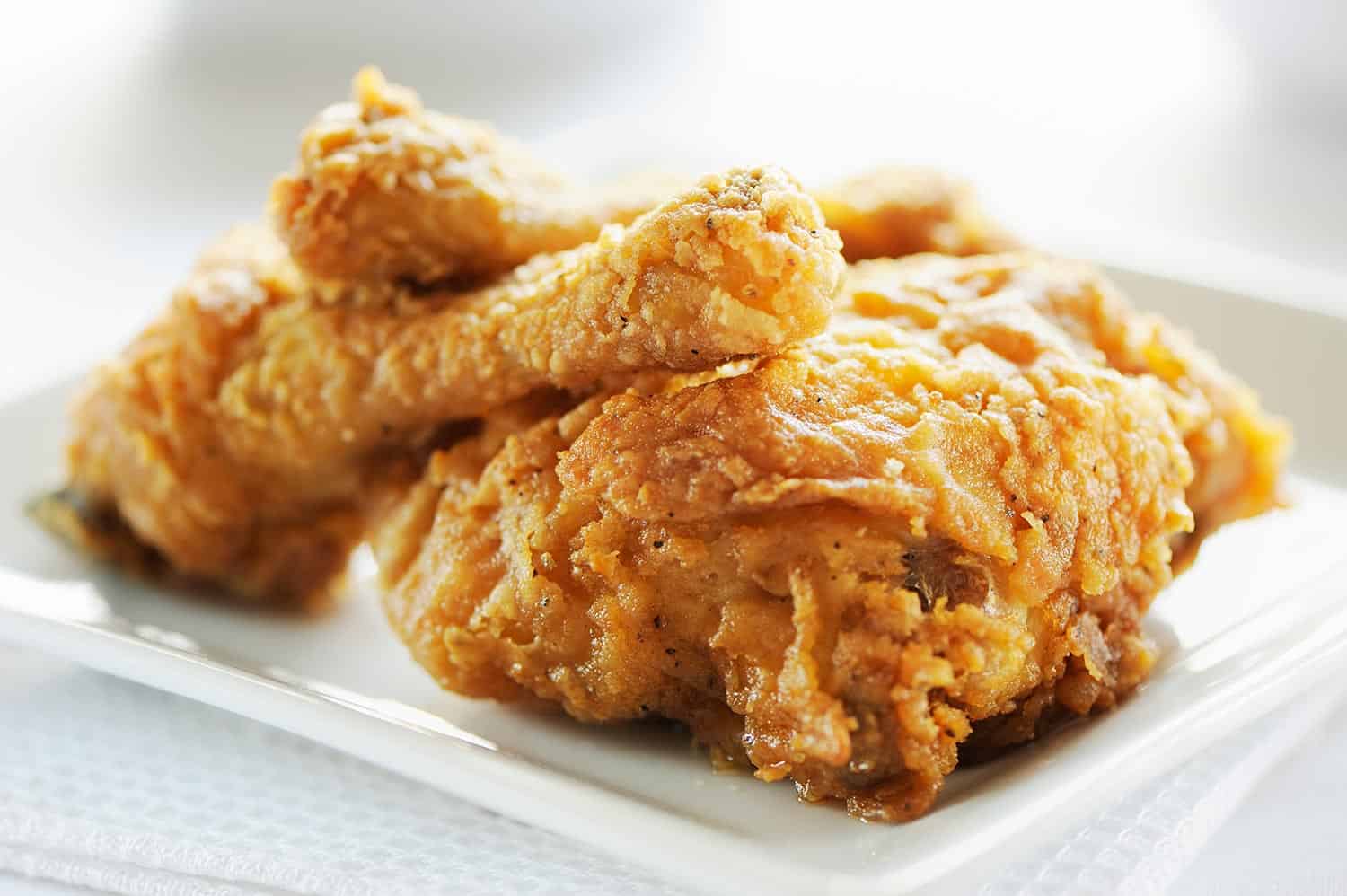 Crispy fried breast and legs of chicken