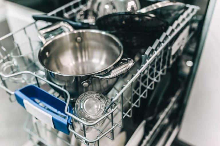 Dishes in a modern dishwasher in the kitchen, Do Countertop Dishwashers Heat The Water?