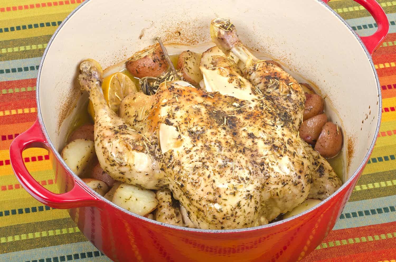 Dutch Oven with roasted chicken, dried herbs and garlic