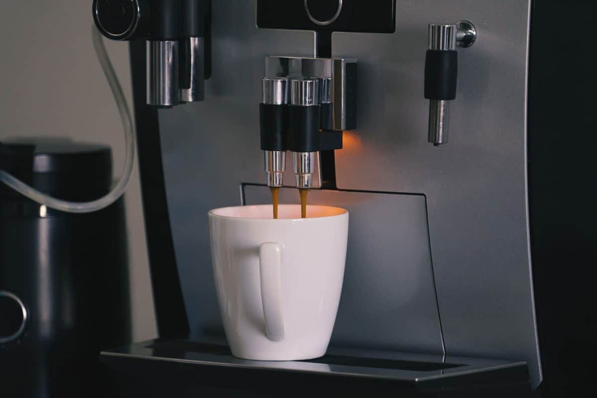 Espresso machine pouring a delicious cup of coffee