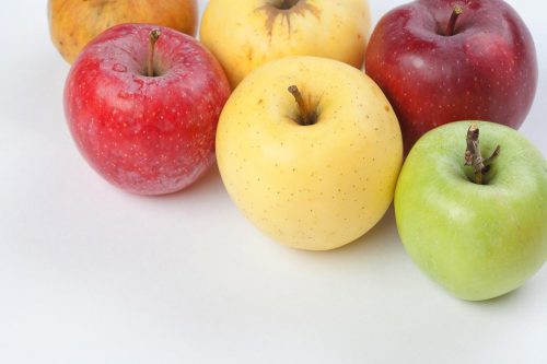 Fresh ripe apple fruits in different colors