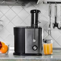 Juicer for fruits and vegetables on the kitchen table, How To Use A Cuisinart Juicer