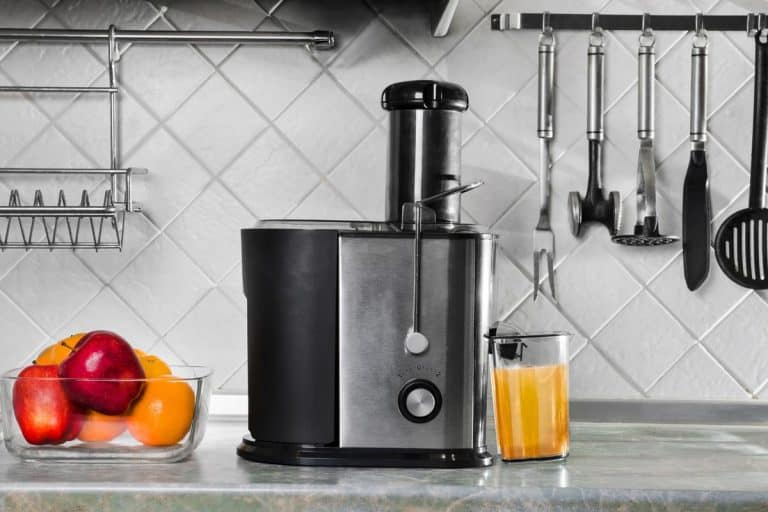 Juicer for fruits and vegetables on the kitchen table, How To Use A Cuisinart Juicer