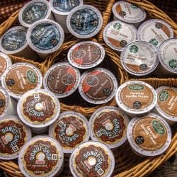 K cups placed in a small basket with dividers, Can You Use K Cups In An Espresso Machine?