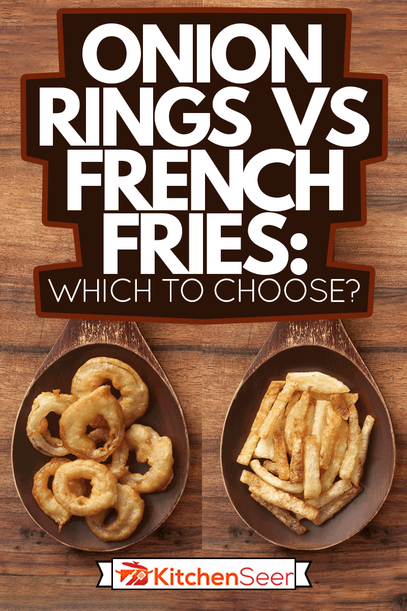 Top view of wooden spoon over wood surface with homemade onion rings and french fries on it, Onion Rings Vs French Fries: Which To Choose?