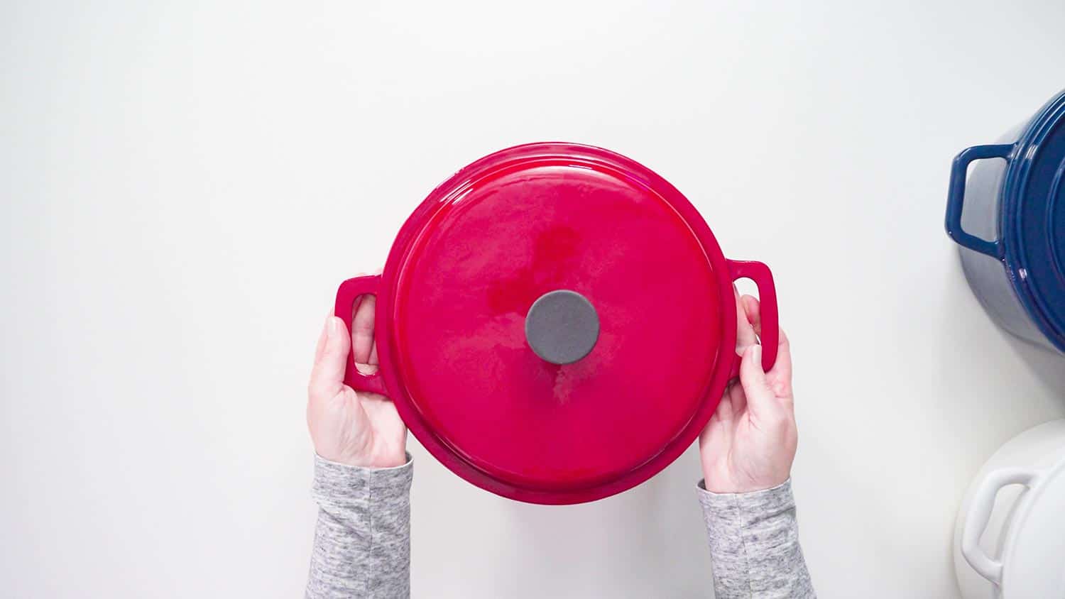 Red enameled cast iron covered Dutch oven