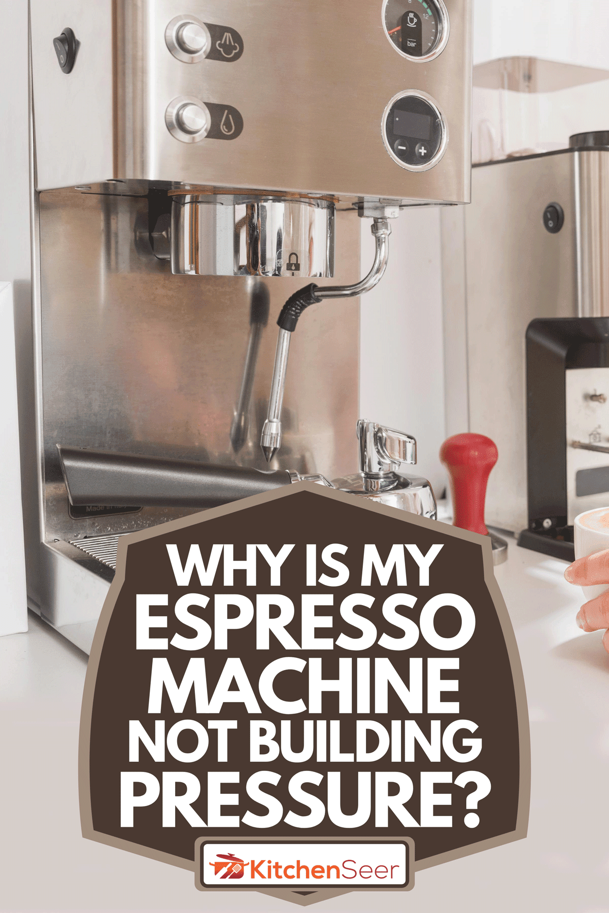 A woman holding a cup of cappuccino prepared on espresso machine, Why is my Espresso Machine not Building Pressure?