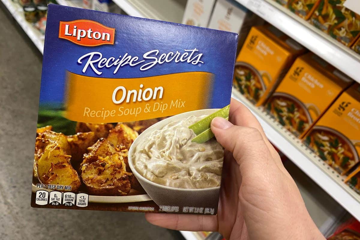 Woman holding a Lipton onion mix