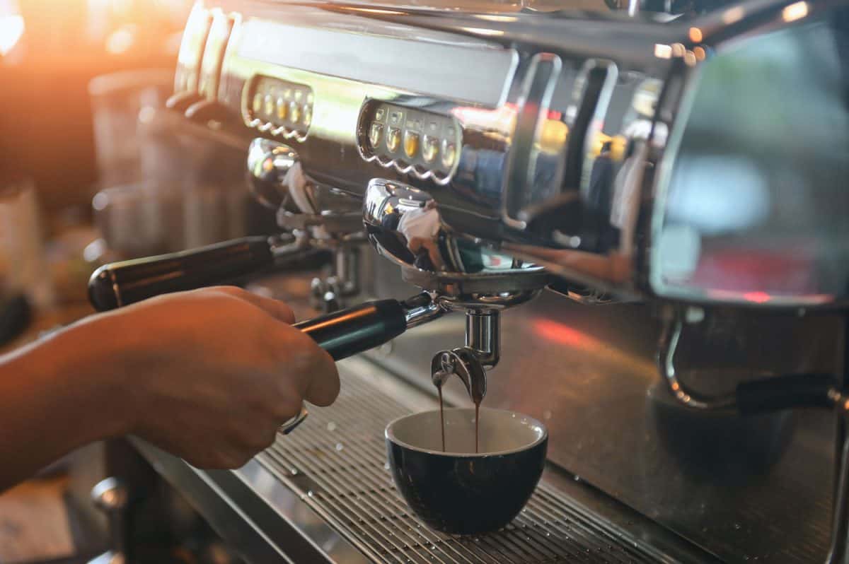 coffee machine,Coffee machine in steam, barista preparing coffee at cafe