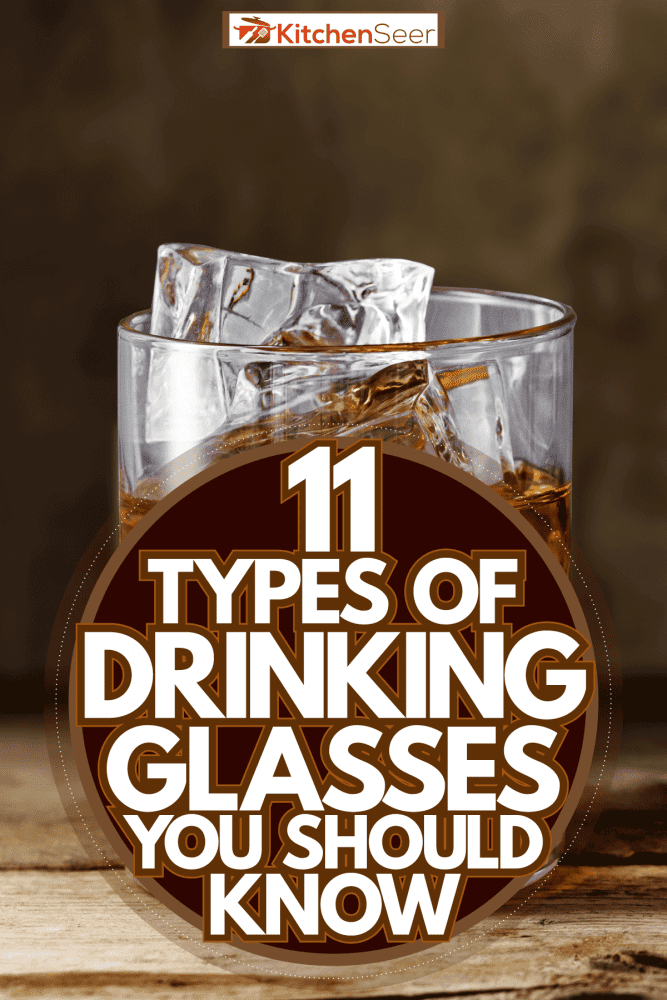A rocks glass with whiskey and ice on the table, 11 Types Of Drinking Glasses You Should Know