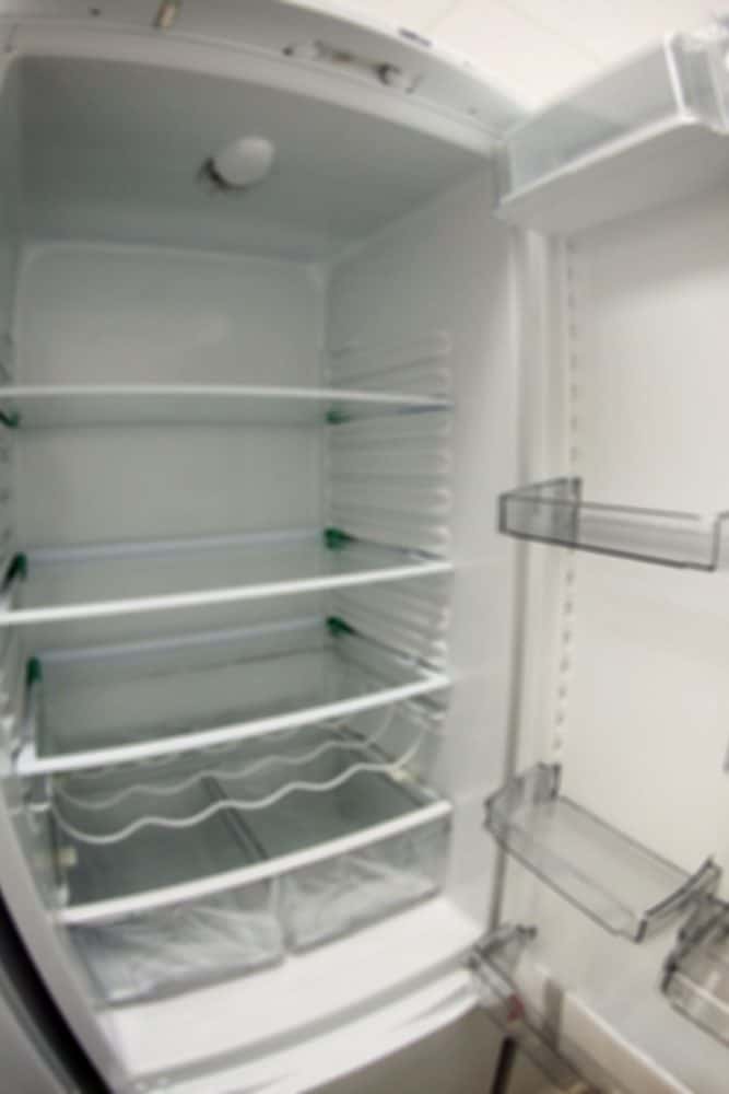 An empty opened refrigerator