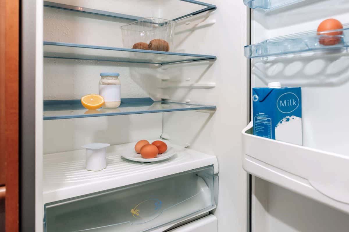 An open and empty fridge