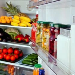 Different kinds of properly arranged fruits and vegetables inside the fridge, What Happens If You Overfill A Fridge?