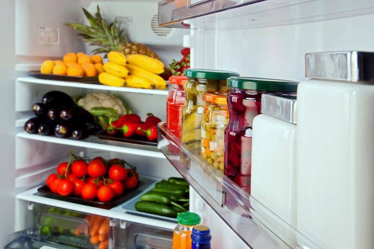 Different kinds of properly arranged fruits and vegetables inside the fridge, What Happens If You Overfill A Fridge?