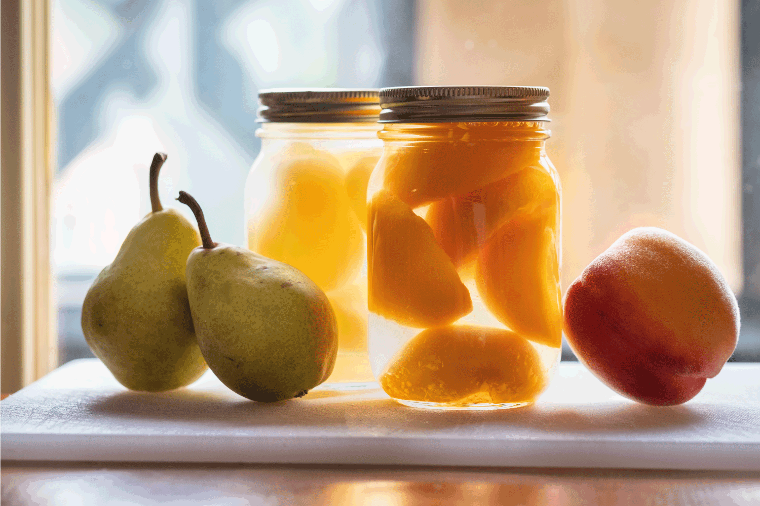 Locally grown pears and peaches - fresh and canned in mason jars