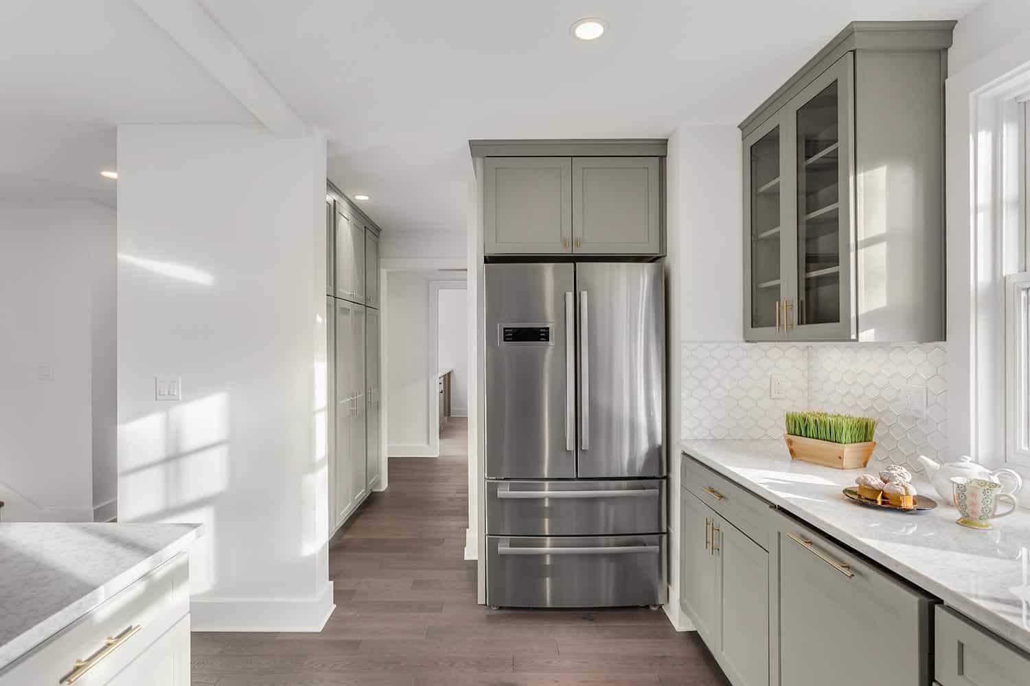 Stainless steel refrigerator in a newly remodeled home