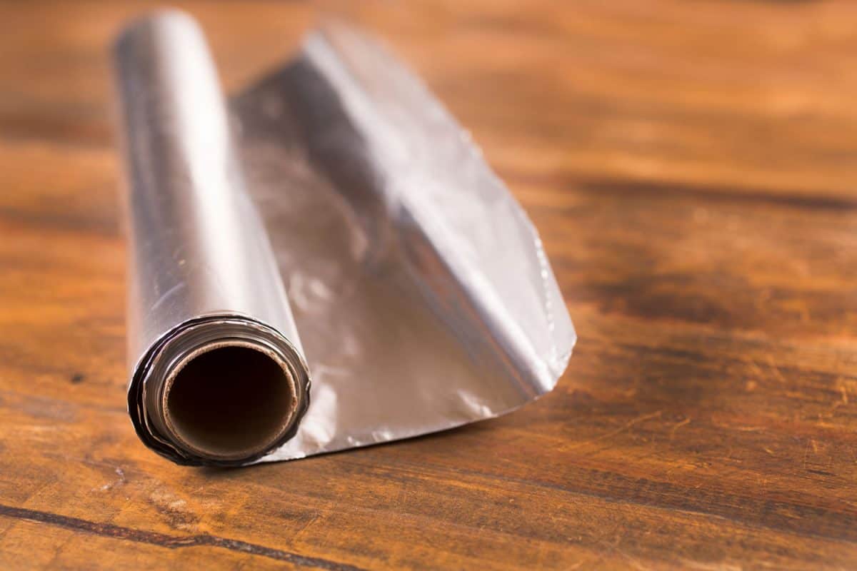 A roll of aluminum foil on the table