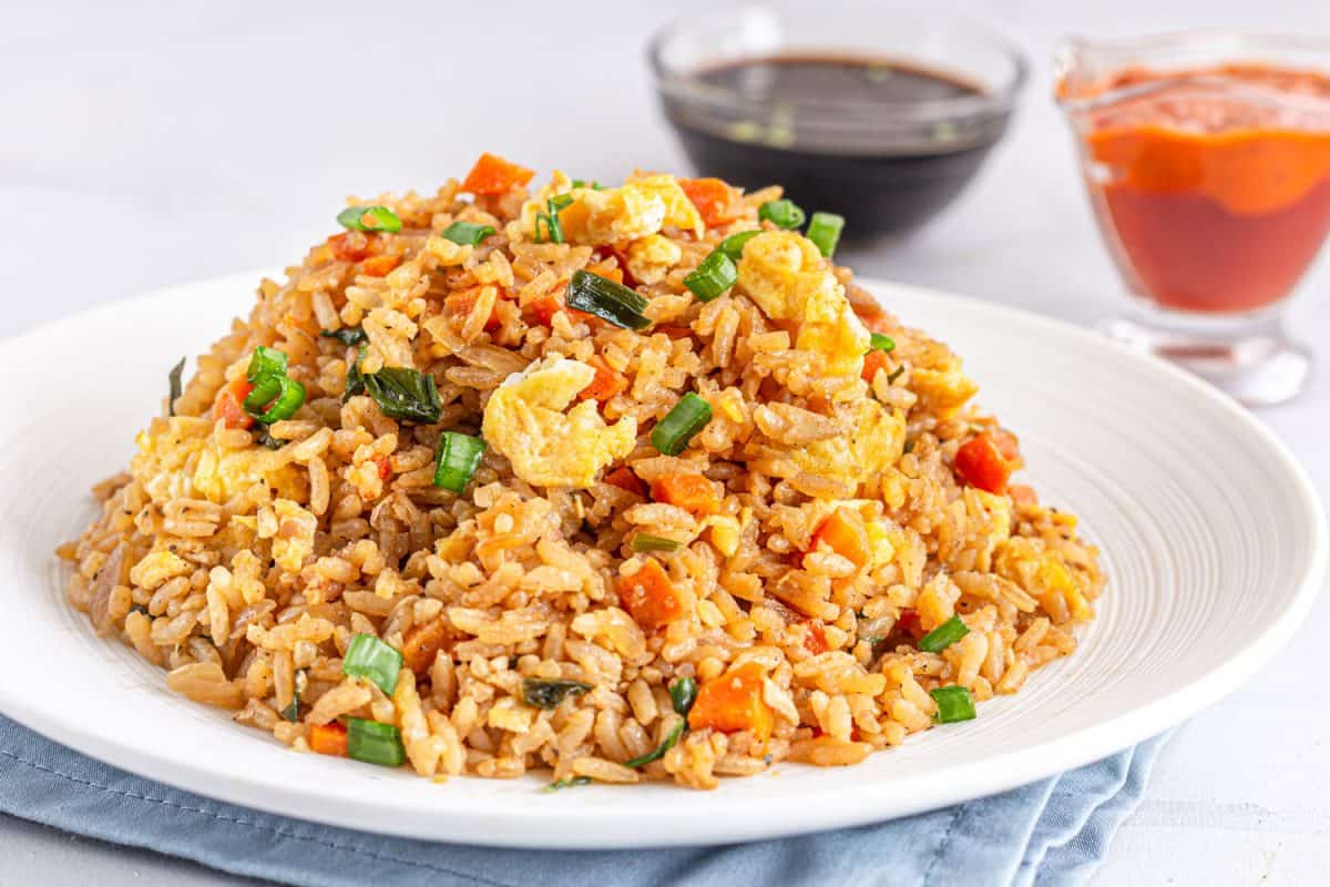 Asian Chinese Fried Rice with Scrambled Eggs and Vegetables Close UP Photo.