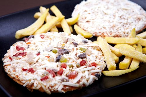 Frozen pizza with frozen french fries