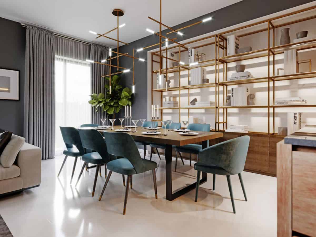 Large modern dining table in a trendy style, dining area in a studio apartment. Wooden table top, fabric blue chairs.