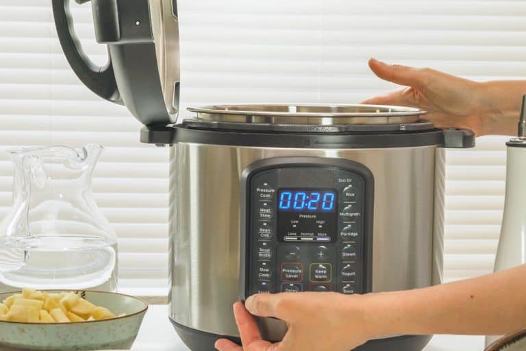 A modern electric multi cooker on a kitchen table, How To Close The Lid On A Cuisinart Pressure Cooker