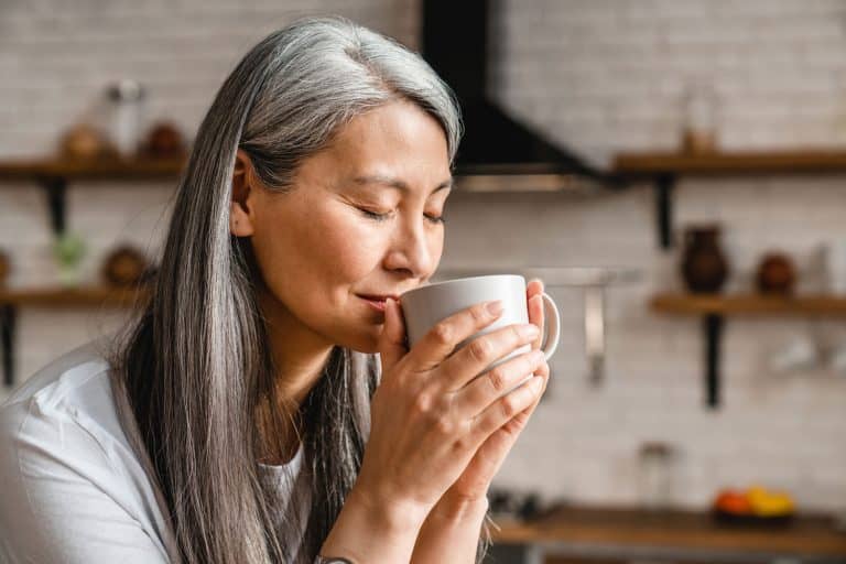 Nice-looking caucasian mature woman drinking hot coffee, What Are The Best Drinking Glasses For The Elderly?