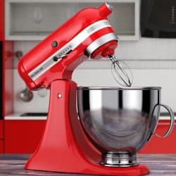 A red kitchen stand food mixer on a wooden table, How Much Does A Cuisinart Mixer Weigh?