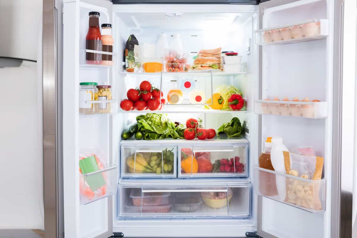 Vegetables and tomatoes inside the refrigerator