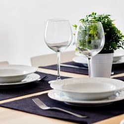 able settings wait for guests at home or restaurant artificial potted plant for decoration - Should You Use Placemats With A Tablecloth?