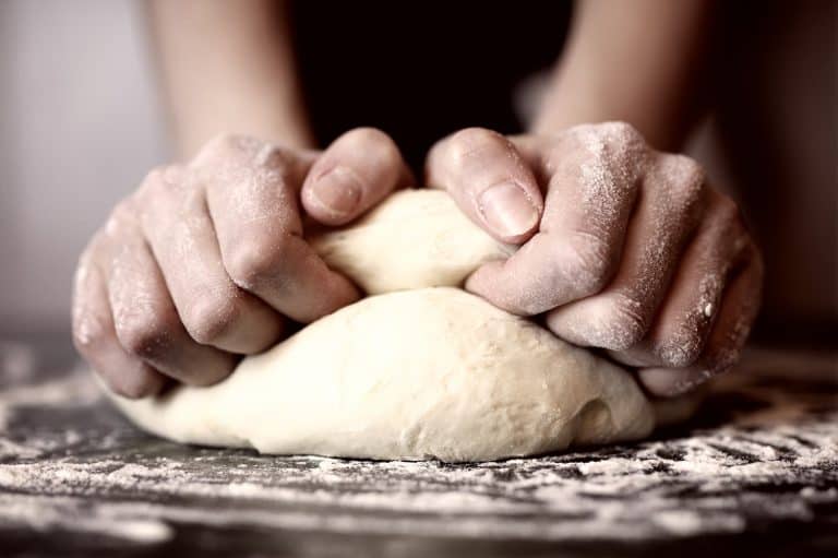 pizza prepare dough hand topping - How Much Yeast Do You Need For Pizza Dough?