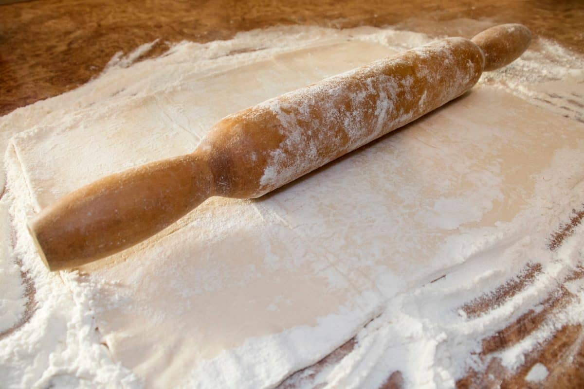  pizza dough. flour and thawed dough,